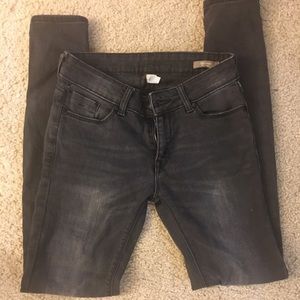 Washed out black skinny jeans